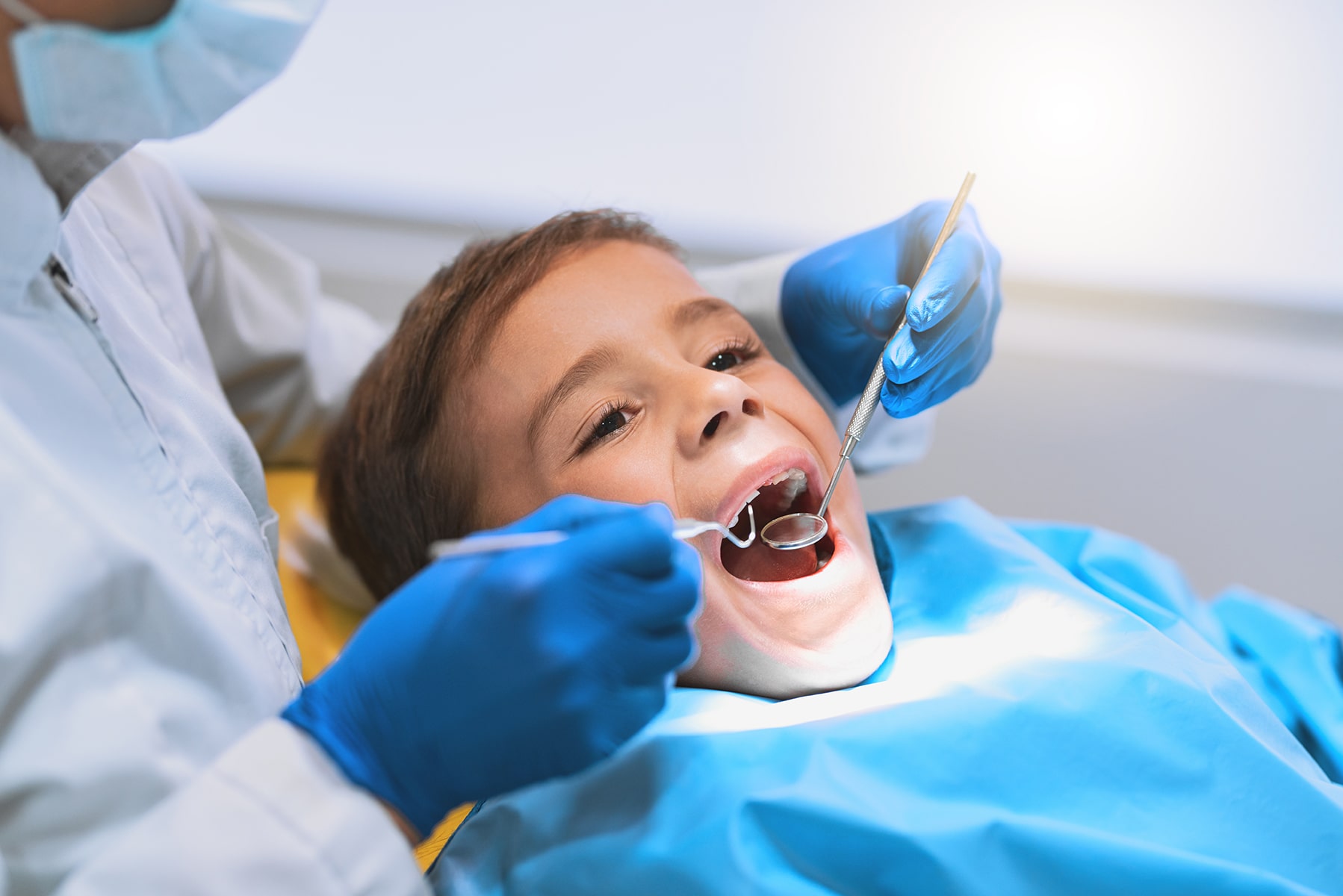 Boy getting a pediatric dental cleaning in Cincinnati, OH