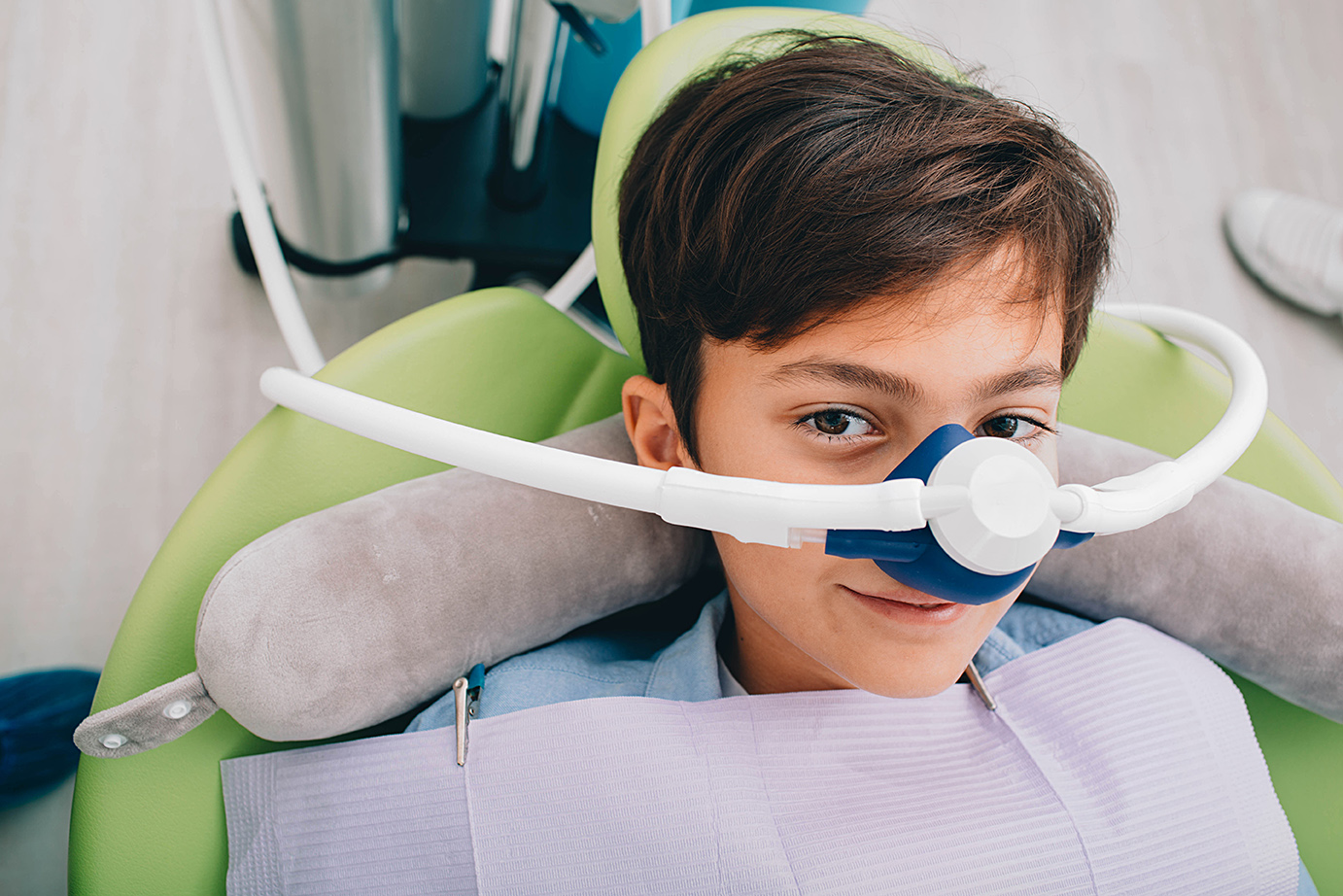 young dental patient during nitrous oxide dental sedation appointment at queen city pediatric dentistry